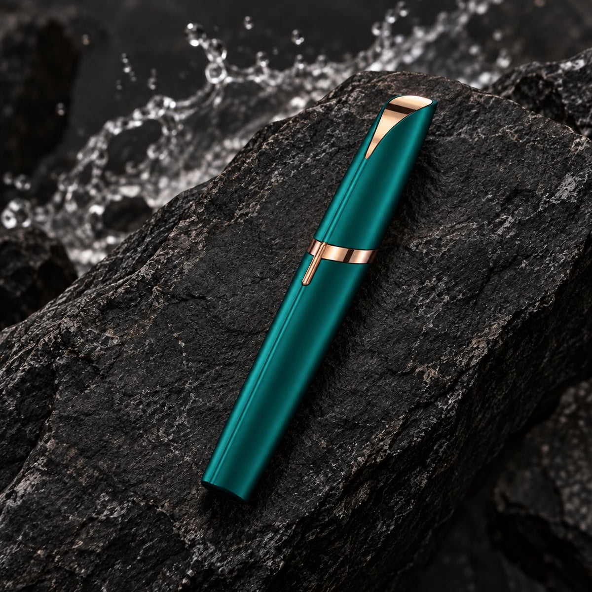 Astrella facial hair remover — green — capped device on stone