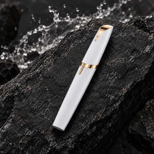 Astrella facial hair remover — white — capped device on stone